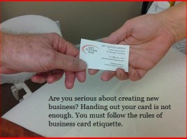 handing out a business card
